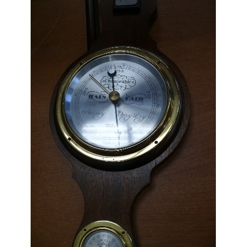 270 - A VINTAGE WOOD FRAMED BAROMETER