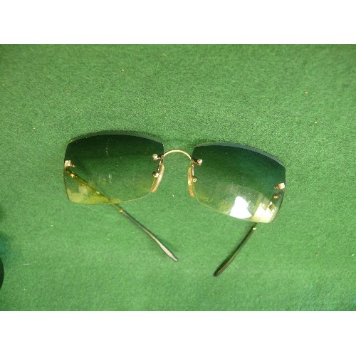 18 - PAIR OF GREEN TINTED SUNGLASSES WITH DIAMANTE DETAILS TO THE HINGE, IN A FENDI CASE