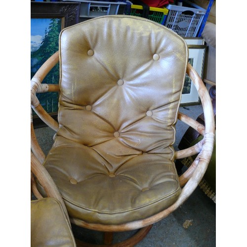 407 - PAIR OF SWIVEL CANE CHAIRS WITH TAN BUTTON LEATHER SEATS