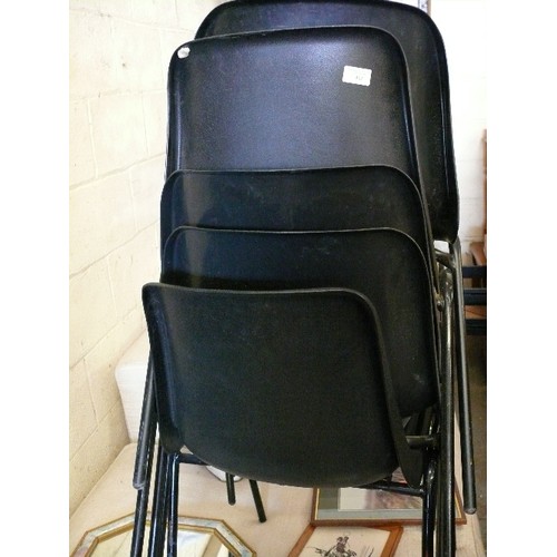 402 - FIVE BLACK STACKABLE PLASTIC MOULDED CHAIRS