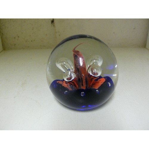 235 - A DECORATIVE GLASS PAPERWEIGHT