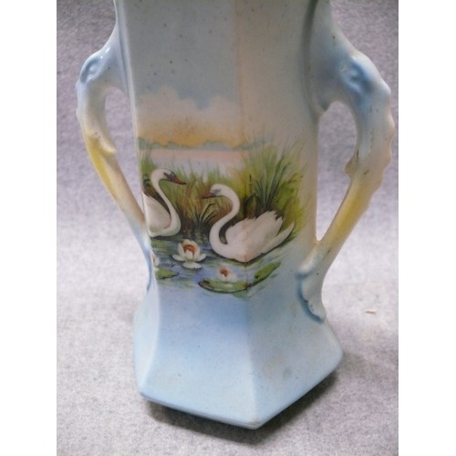 82 - A PAIR OF AUSTRIAN CHINA SWAN VASES