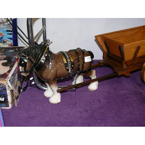 131 - A LARGE SHIRE HORSE FIGURE WITH A WOODEN CART