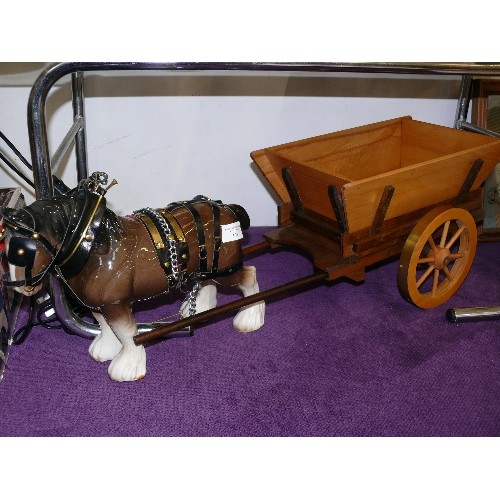 131 - A LARGE SHIRE HORSE FIGURE WITH A WOODEN CART