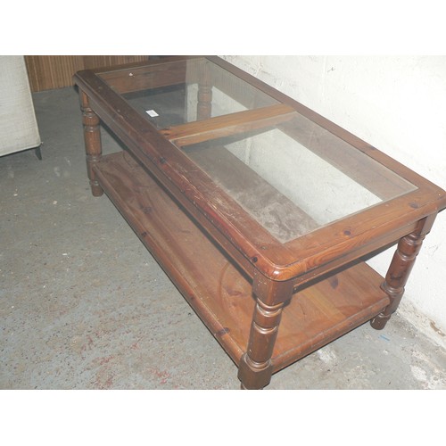 353 - SOLID PINE COFFEE TABLE, 2 GLASS INSERTS AND A SOLID PINE LOWER SHELF.