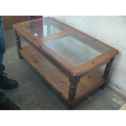 353 - SOLID PINE COFFEE TABLE, 2 GLASS INSERTS AND A SOLID PINE LOWER SHELF.