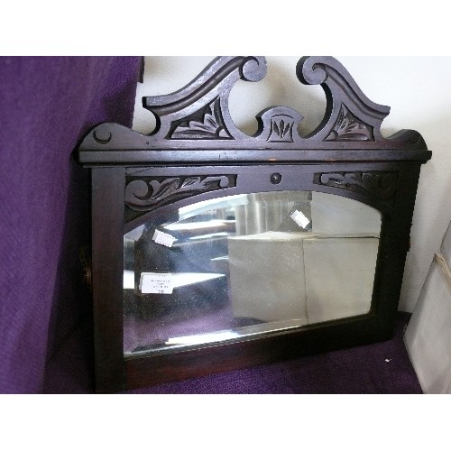 108 - SMALL BEVEL EDGED MIRROR IN CARVED WOODEN FRAME