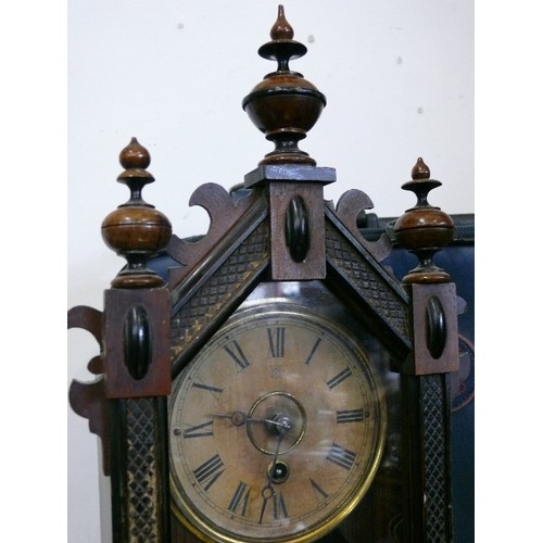 137 - A JUNGHANS WOOD CARVED MANTLE CLOCK