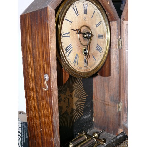 137 - A JUNGHANS WOOD CARVED MANTLE CLOCK