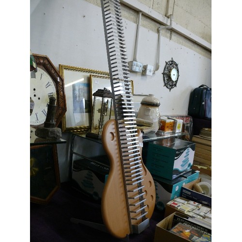 154 - A WOOD AND METAL GUITAR CD RACK