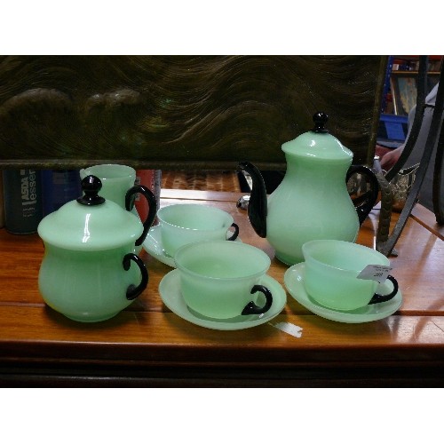 268 - A BEAUTIFUL GREEN GLASS PART TEASET WITH TEAPOT, SUGAR BOWL, MILK JUG AND CUPS & SAUCERS