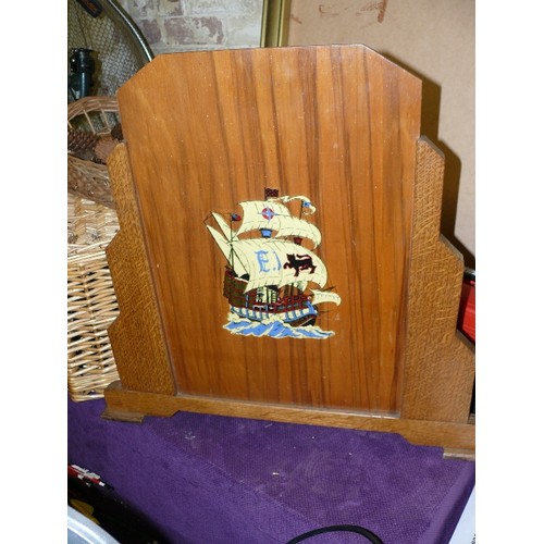 251 - A WOODEN ART DECO FIRE SCREEN FEATURING A SHIP