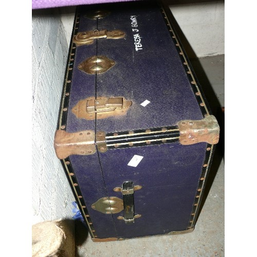 167 - A LARGE BLUE STORAGE TRUNK