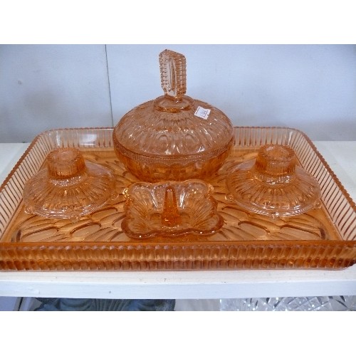 130 - AN AMBER GLASS DRESSING TABLE SET