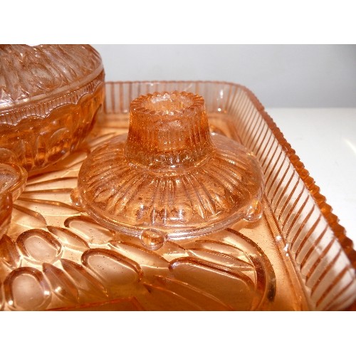 130 - AN AMBER GLASS DRESSING TABLE SET