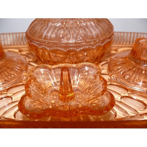 130 - AN AMBER GLASS DRESSING TABLE SET