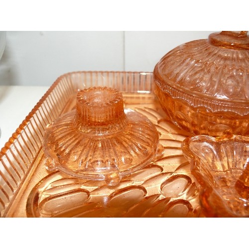 130 - AN AMBER GLASS DRESSING TABLE SET