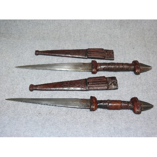 117 - PAIR OF AFRICAN KNIVES IN WOODEN SCABBARD