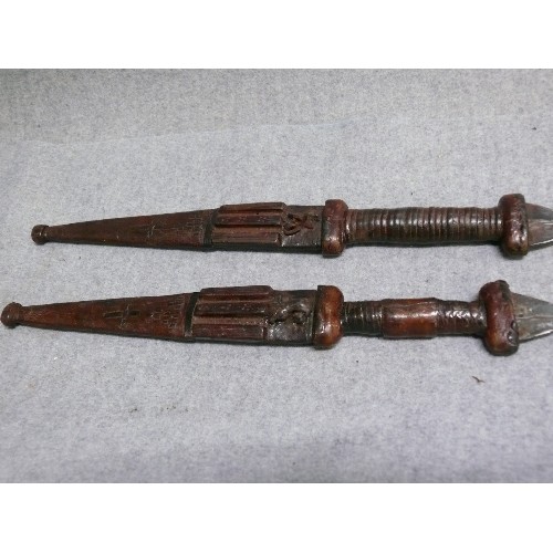 117 - PAIR OF AFRICAN KNIVES IN WOODEN SCABBARD