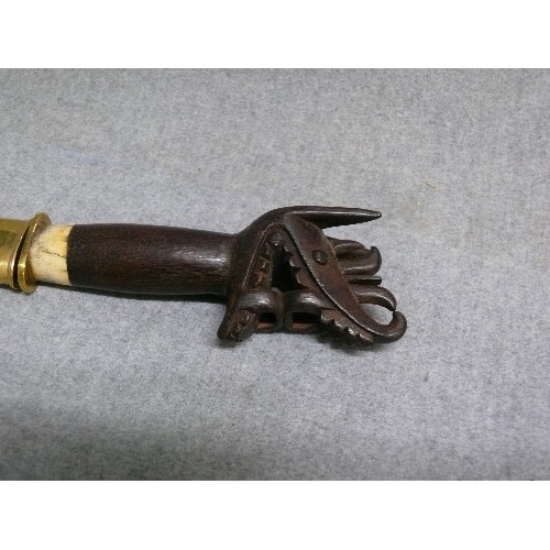 118 - ASIAN/AFRICAN KNIFE IN SCABBARD, DRAGON HEAD