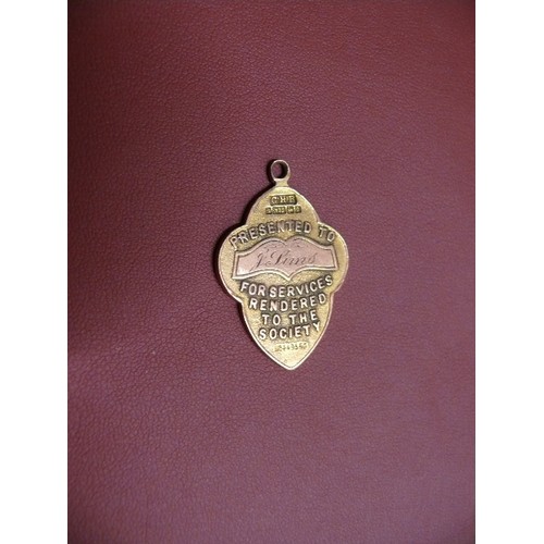 12 - A SOLID 9CT GOLD PENDANT MEDAL PRESENTED TO J LIMS IN 1857 BY HEARTS OF OAK BENEFIT SOCIETY FOR SERV... 