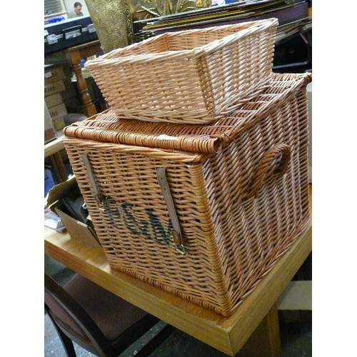 334 - F & M LARGE WICKER BASKET WITH HANDLES AND LEATHER FASTENING STRAPS PLUS ANOTHER SMALL WICKER BASKET