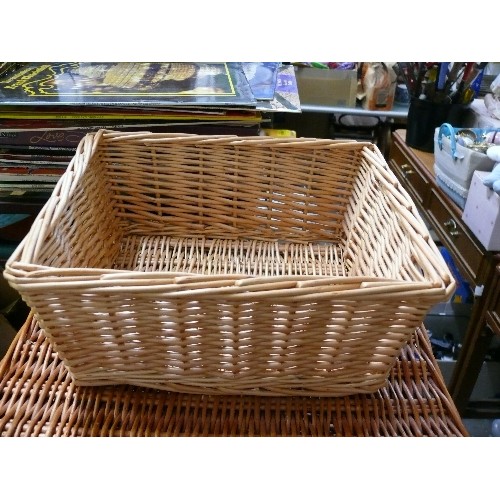 334 - F & M LARGE WICKER BASKET WITH HANDLES AND LEATHER FASTENING STRAPS PLUS ANOTHER SMALL WICKER BASKET