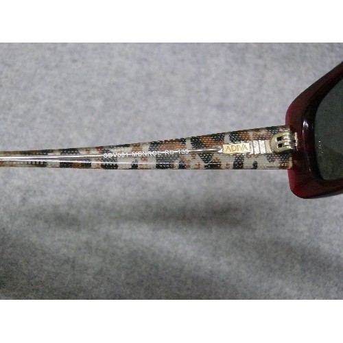 64 - A HIGH FASHION PAIR OF DESIGNER SUNGLASSES BY ADIVA