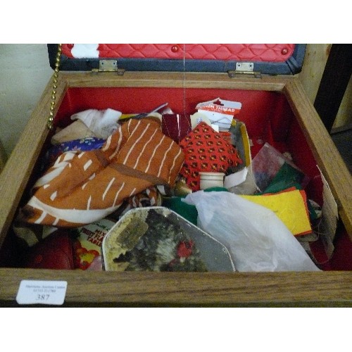 387 - RETRO WORKBOX/STOOL ON SPAYED  LEGS,  BLACK VINYL SEAT, LINED IN RED  WITH  SEWING CONTENTS