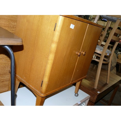 411 - SMALL VENEERED VINTAGE CUPBOARD ON CASTORS