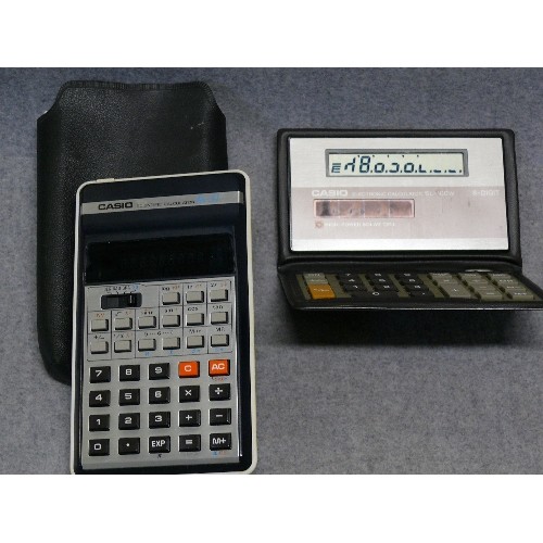 37 - 2 VINTAGE CASIO CALCULATORS - SL-100W 8-DIGIT SOLAR POWER AND A CASIO SCIENTIFIC CALCULATOR FX-31