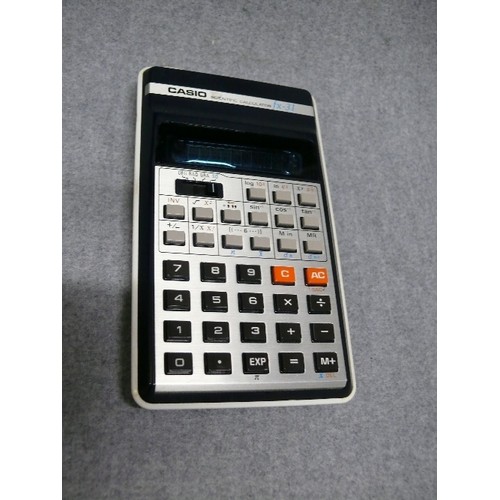 37 - 2 VINTAGE CASIO CALCULATORS - SL-100W 8-DIGIT SOLAR POWER AND A CASIO SCIENTIFIC CALCULATOR FX-31