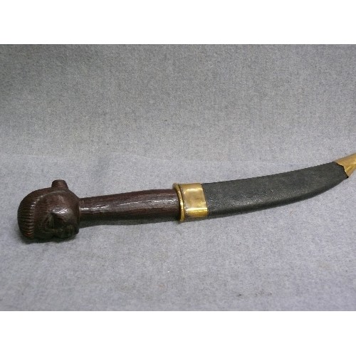 119 - ASIAN/AFRICAN KNIFE IN SCABBARD, WOMAN'S HEAD