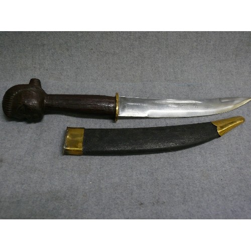 119 - ASIAN/AFRICAN KNIFE IN SCABBARD, WOMAN'S HEAD