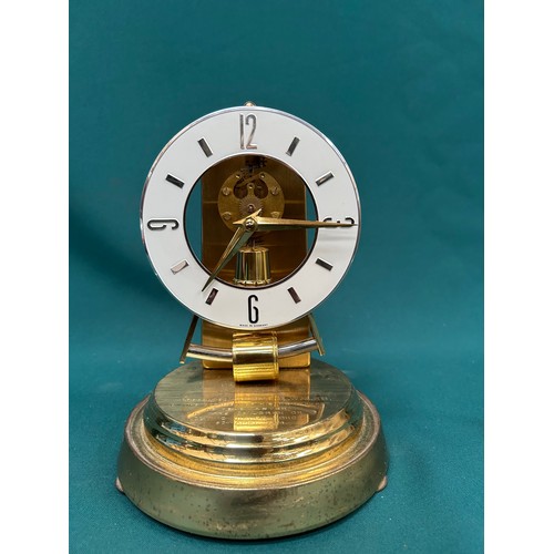 352 - A 1960's Kundo (Kieninger & Obergfell, W Germany)  electronic mantel clock with magnetised pendulum.... 