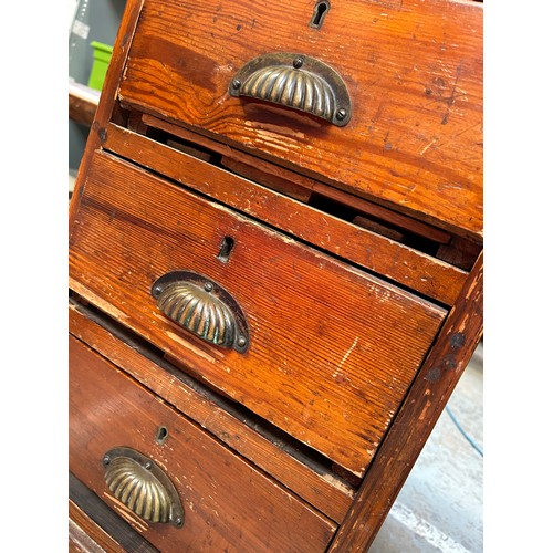 408 - Early 20th Century Pitch Pine pedestal school desk with original brass cup handles, 9 drawers. Brass... 