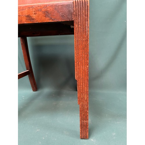 A 1930's Art Deco chair, the reeded front legs stepped back in typical