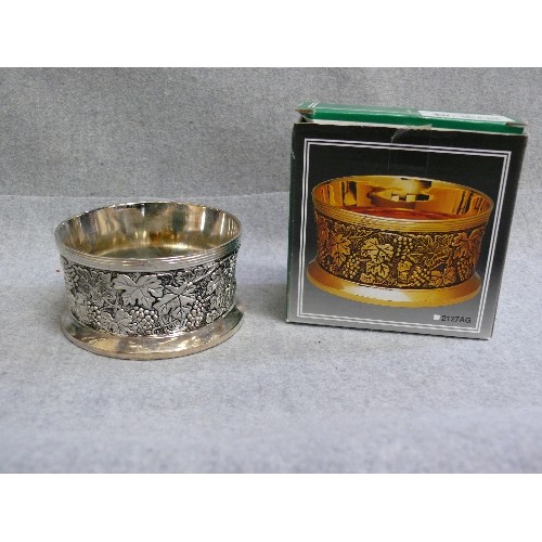 94 - A BOXED VINTAGE SILVERPLATE BOTTLE COASTER