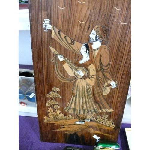 114 - A DECORATIVE WOODEN PLAQUE INLAID WITH MOTHER OF PEARL