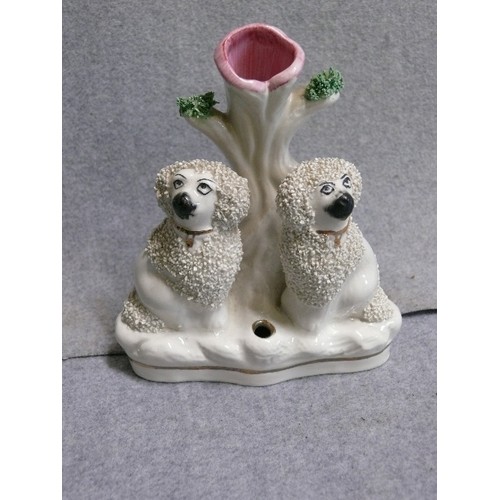 95A - A STAFFORDSHIRE DOG POSY VASE/PEN HOLDER