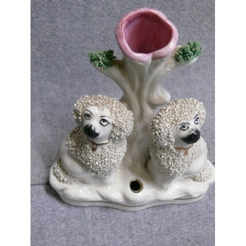 95A - A STAFFORDSHIRE DOG POSY VASE/PEN HOLDER