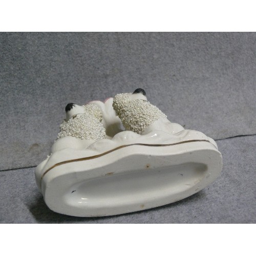 95A - A STAFFORDSHIRE DOG POSY VASE/PEN HOLDER