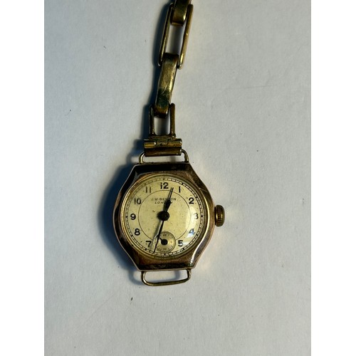 60 - A 9ct gold ladies Swiss watch retailed by J W Benson London, Hallmarked London 1946