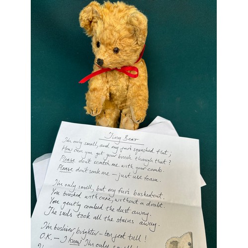 232 - A small Teddy Bear, circa 1930's with stitched nose and glass eyes, jointed limbs. With poem for 