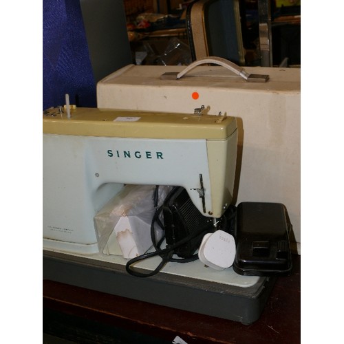 297 - A VINTAGE SINGER SEWING MACHINE