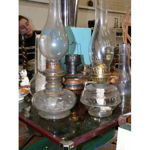 266 - 5 VARIOUS PARAFFIN LAMPS WITH FUNNELS