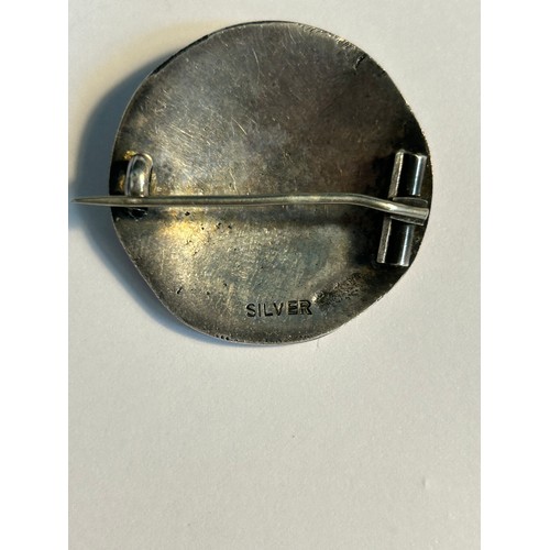 45 - A Scottish sterling silver celtic design brooch, marked 