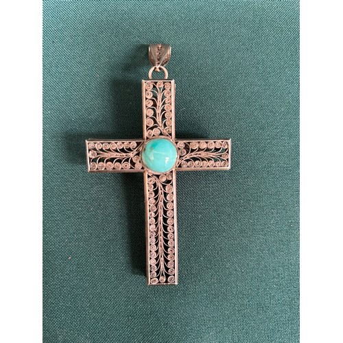 42 - A large silver pectoral cross in filigree wire work set with turquoise cabochon - 9cm - unmarked