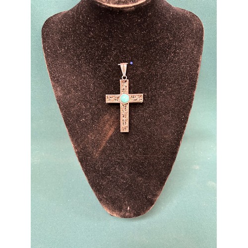 42 - A large silver pectoral cross in filigree wire work set with turquoise cabochon - 9cm - unmarked