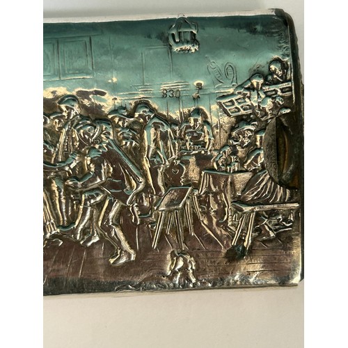 21 - A North European 830 silver match holder vesta with embossed dancing scene